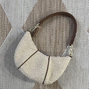 Rothy's Mini Honeybun Boucle Crescent shoulder bag